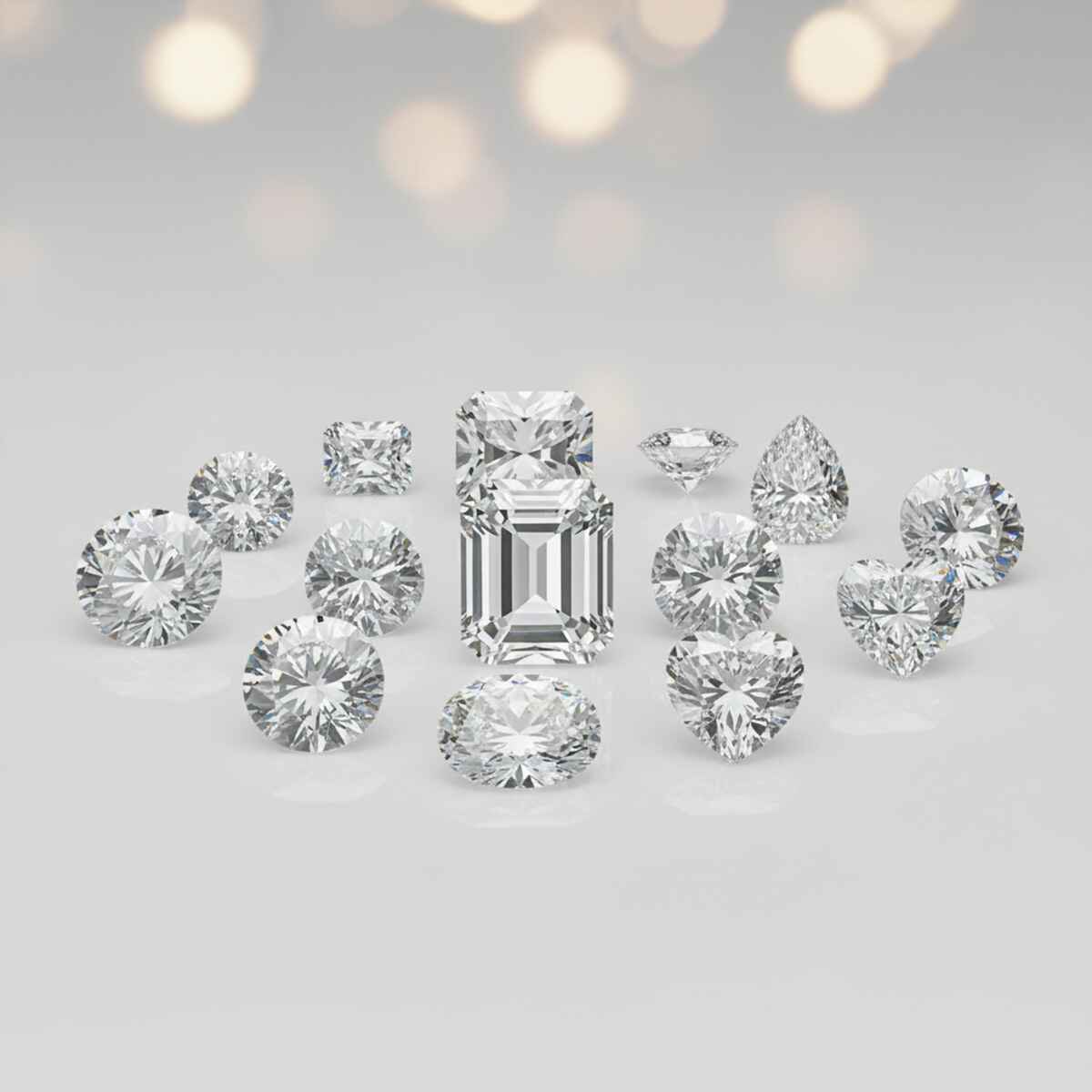 A collection of loose colorless diamonds in round, emerald, heart and pear cuts
