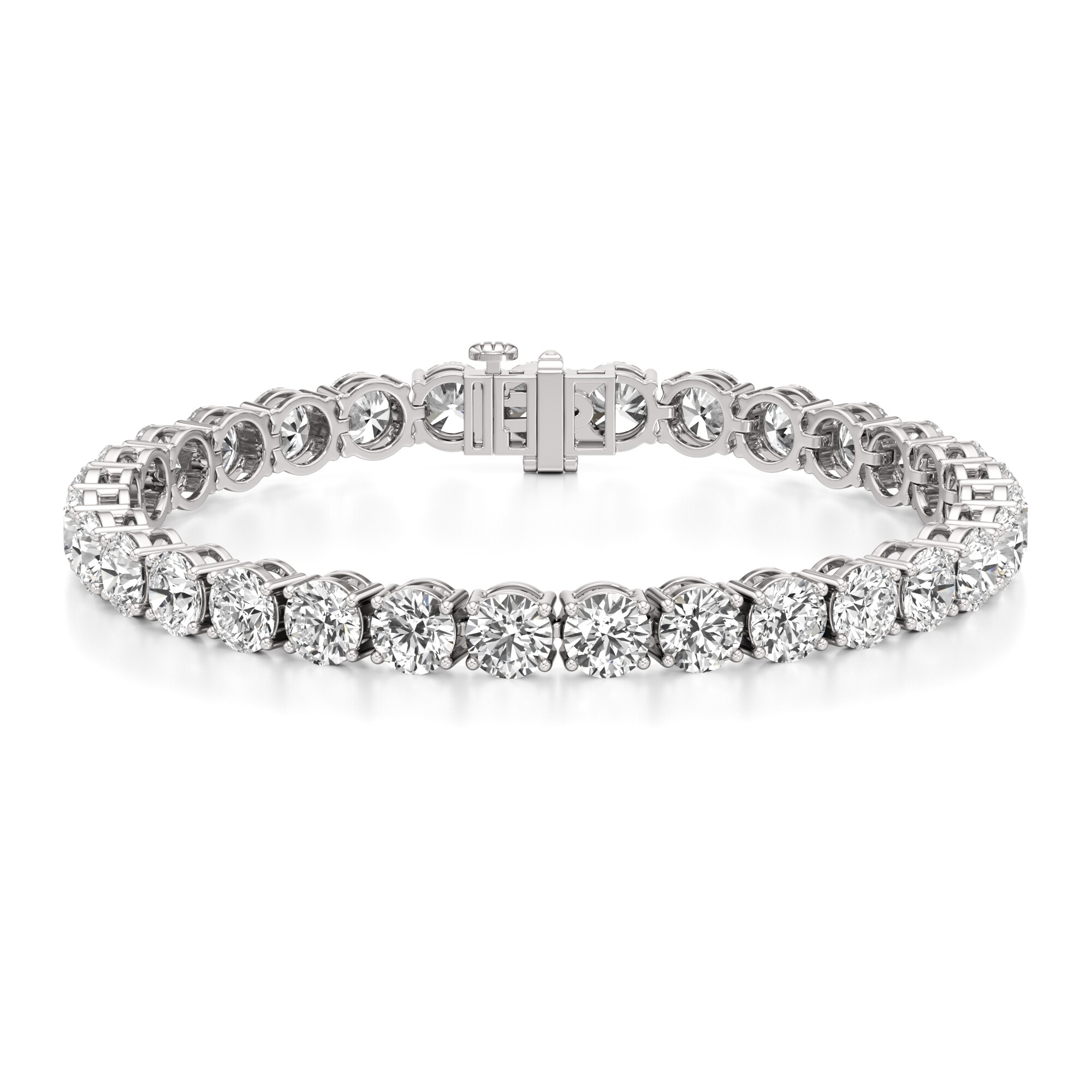 A diamond tennis bracelet of round brilliant stones in white gold on a white surface